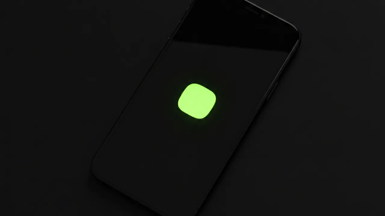 Karanlık zeminde telefon ekranında tek bir lime yeşili yuvarlak kare ikon